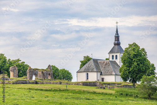 Gudhems church by an old abbey ruin in Sweden photo