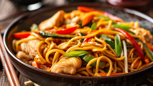 Chicken lo mein, stir fried noodles vith vegetables