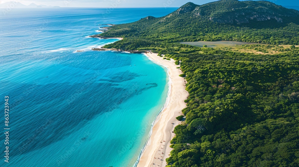 An overhead view of a pristine coastline with turquoise waters, white sandy beaches, and lush green vegetation An overhead view of a pristine coastline with turquoise waters, white sandy beaches, and lush green vegetation
