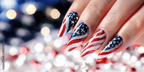 Beautician showing her new american flag painted nails for independence day