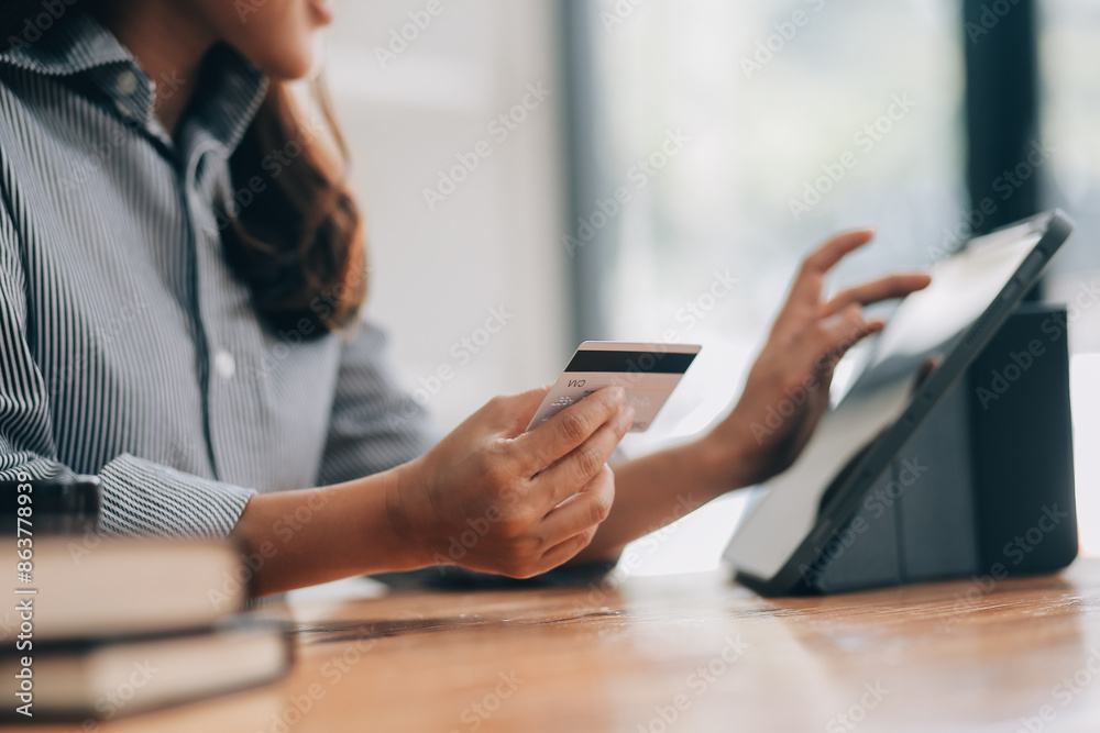 Happy asian woman using smartphone shopping online with credit card. Lifestyle. Easy pay using smart phone or digital device. Happy asian woman using smartphone shopping online with credit card. Lifestyle. Easy pay using smart phone or digital device.