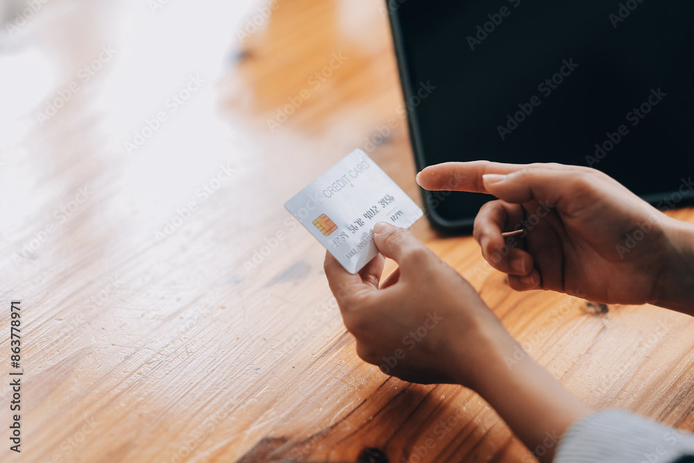 Happy asian woman using smartphone shopping online with credit card. Lifestyle. Easy pay using smart phone or digital device. Happy asian woman using smartphone shopping online with credit card. Lifestyle. Easy pay using smart phone or digital device.