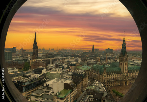 General views of the city of Hamburg in northern Germany with sunset clouds and colors Saint Peter's church city hall  animals living in the alster lake and around photo