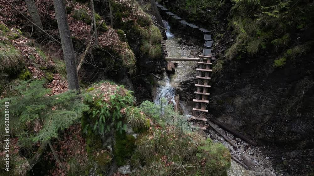 High angle view of a stream running down the rocks in the forest, Slovakia, 4k High angle view of a stream running down the rocks in the forest, Slovakia, 4k
