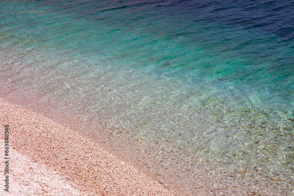 Obraz premium Padulella beach in Tuscany, Elba island. the crystal clear waters of the Elba island seen from the drone