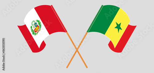 Crossed and waving flags of Peru and Senegal