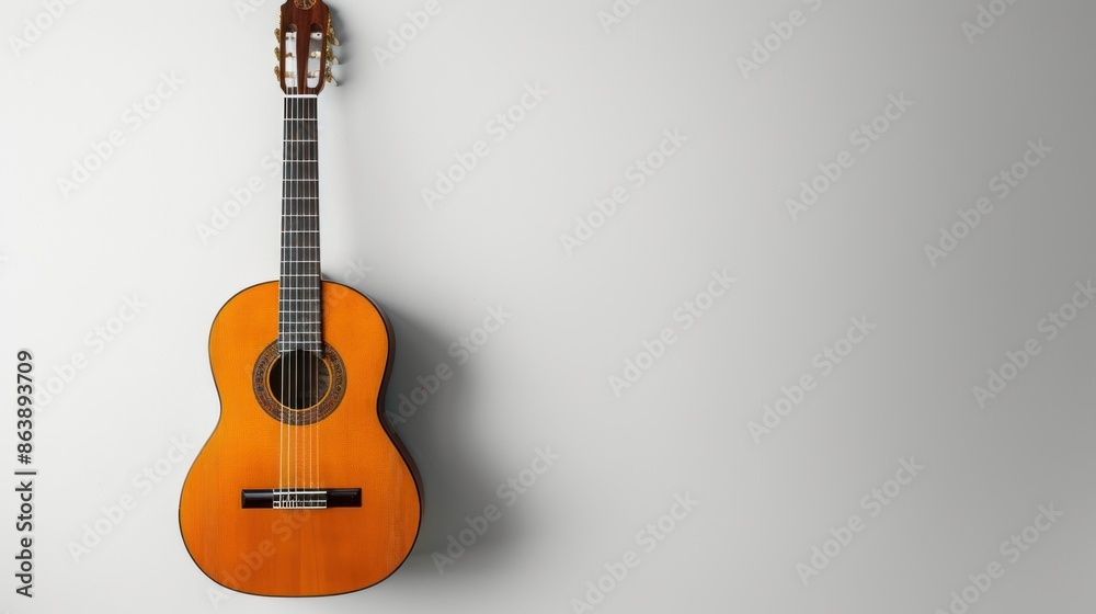 Fototapeta premium The guitar is placed on a frame on a white background