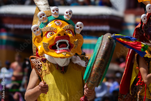 A colorful mask dance and drum beating being performed at Hemis Monastery at Leh, Ladakh India.