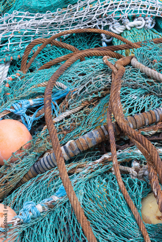 Nylon fishing nets in different colours and states of repair Nylon fishing nets in different colours and states of repair