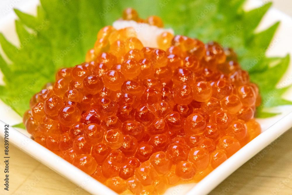 Bowl of fresh salmon roe. Bowl of fresh salmon roe.