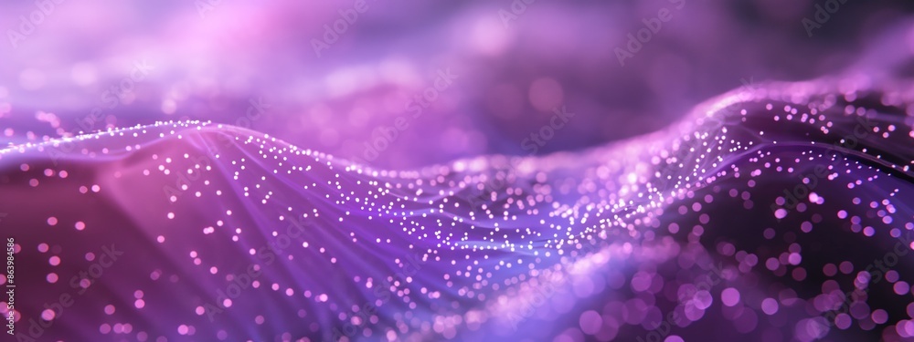 Abstract background with purple and pink glowing particles on flowing ...