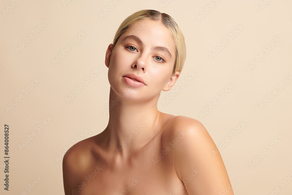Beautiful young woman with clean fresh skin on beige background, Face care, Facial treatment, Cosmetology, beauty and spa, women portrait. Beautiful young woman with clean fresh skin on beige background, Face care, Facial treatment, Cosmetology, beauty and spa, women portrait.