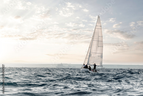 Sailing into the sunset on tranquil waters