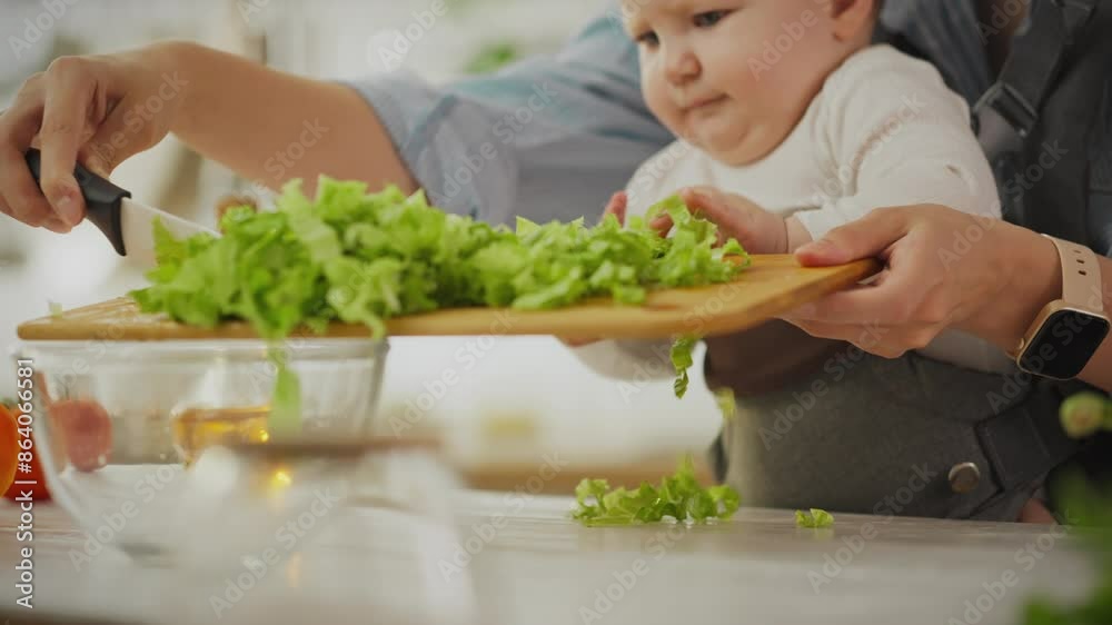 Housewife using kitchen utensils prepares food with child in the kitchen. A modern woman preparing a breakfast of vegetables with a child introduces advanced education methods, comfort