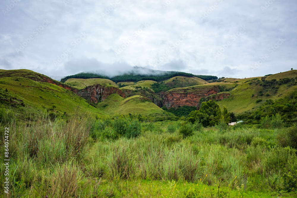 Naklejka premium The Pinnacle rock a very tall quartzite rock in Graskop Mpumalanga South Africa, Pinnacle Rock near Graskop, Panorama Route South Africa
