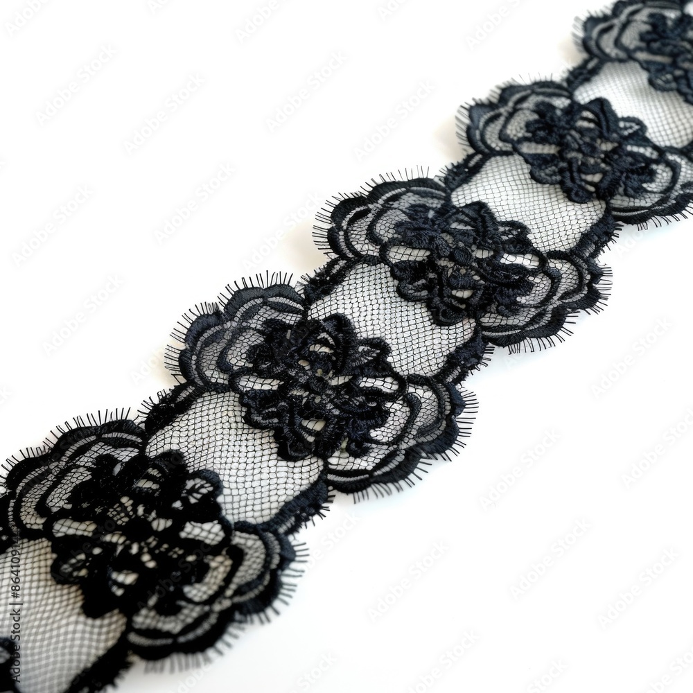 Obraz premium Black Lace Ribbon. Band of Black Lace Ribbon on Isolated White Background