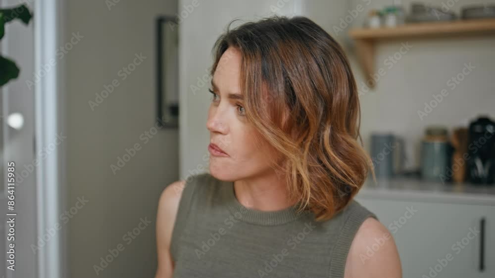 Closeup beautiful woman talking kitchen interior. Lady communicating at home