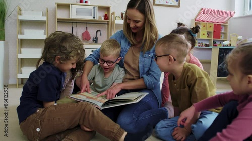 Children playing with toy blocks in the kindergarten