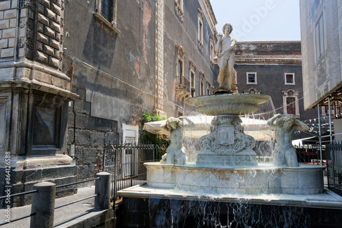 Amenan Baroque Fountain of mythical figures by Tito Angelini and inscribed with the city's coat of arms and a young man holding a cornucopia, Catania, Sicily, Italy, Mediterranean, Europe