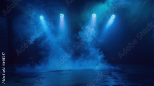 Three bright blue stage lights shining through smoke on a dark night