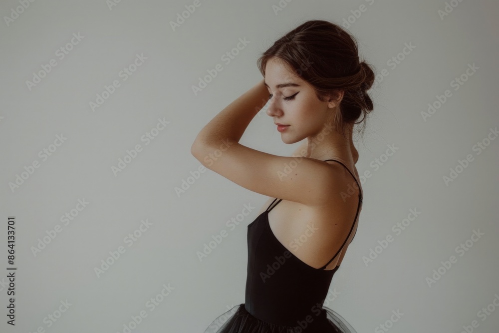 The portrait artist depicted the ballet dancer's elegance through her poised pose, emphasizing the grace of her movements The portrait artist depicted the ballet dancer's elegance through her poised pose, emphasizing the grace of her movements