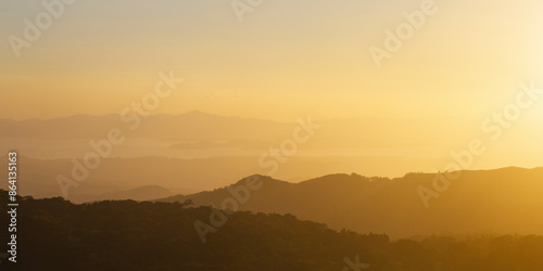 Sunset over landscape near Santa Elena, Puntarenas Province, Costa Rica, Central America photo