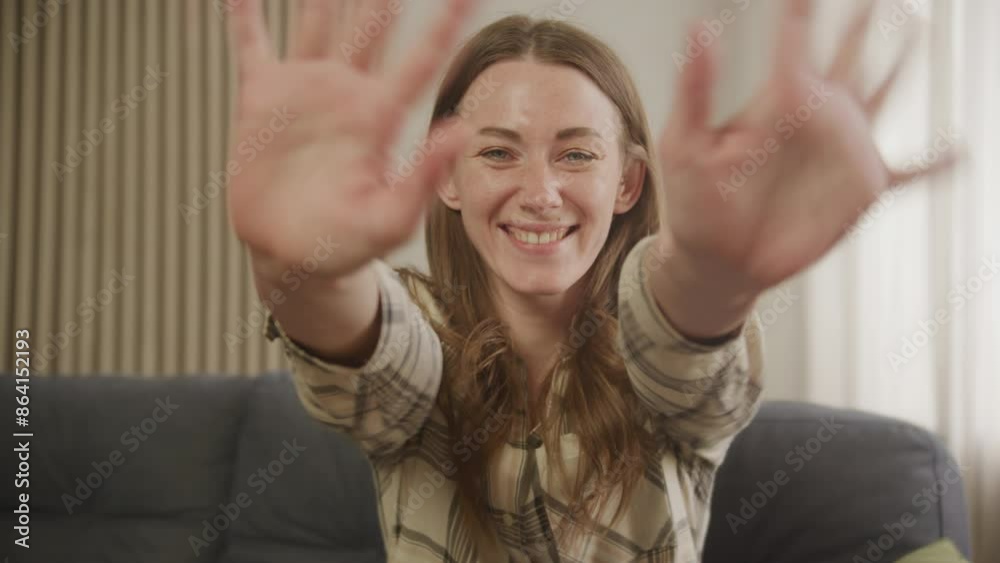 Woman Waving Hand in Greeting Gesture, Female Talking Emotionally on Video Call Woman Waving Hand in Greeting Gesture, Female Talking Emotionally on Video Call