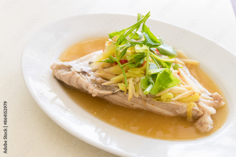 Delicious and healthy steamed fish with ginger and scallions, served with jasmine rice. Delicious and healthy steamed fish with ginger and scallions, served with jasmine rice.