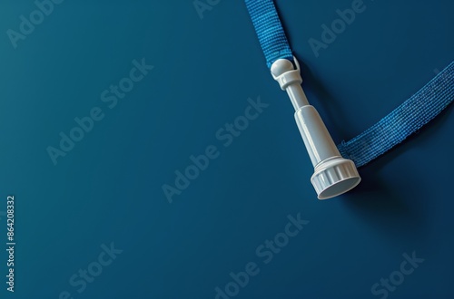 White Lanyard Clip Against a Blue Background