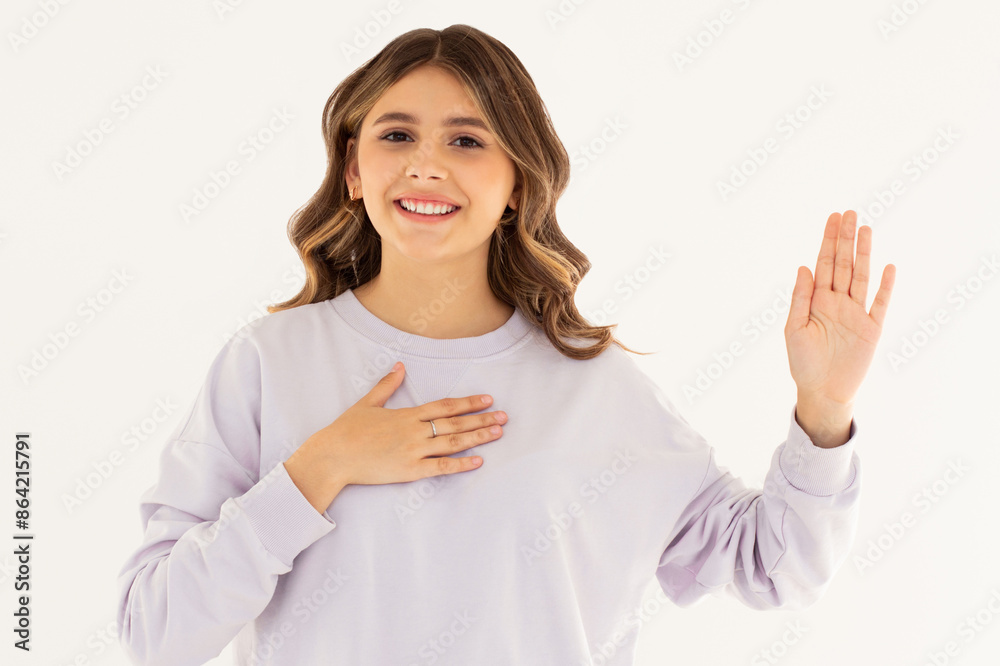 Photo of confident adorable lovely girl dressed in purple sweatshirt hold palm on chest isolated on white background Photo of confident adorable lovely girl dressed in purple sweatshirt hold palm on chest isolated on white background