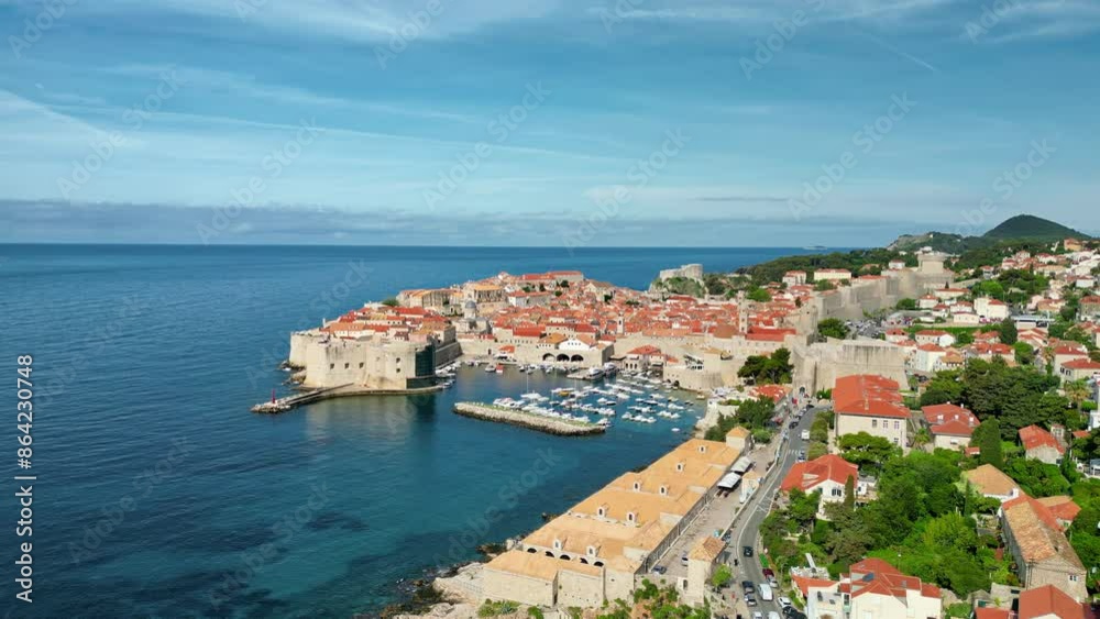 Aerial, drone view of buildings on the shore of the Adriatic sea in Dubrovnik, Croatia Aerial, drone view of buildings on the shore of the Adriatic sea in Dubrovnik, Croatia