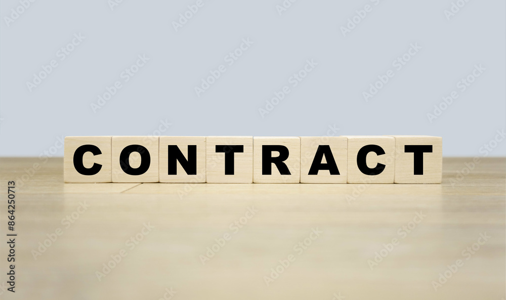 Contract word written on wooden blocks. Contract text for your desing, concept. Contract word written on wooden blocks. Contract text for your desing, concept.