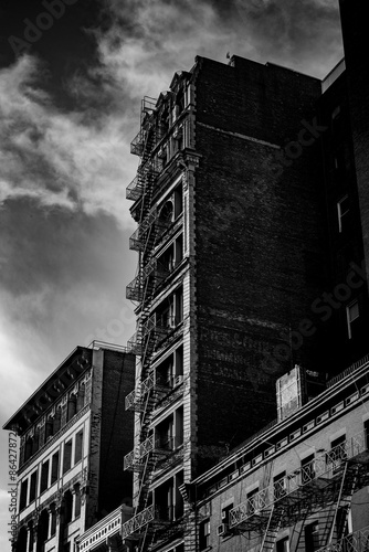 New York City buildings and sunset sky 