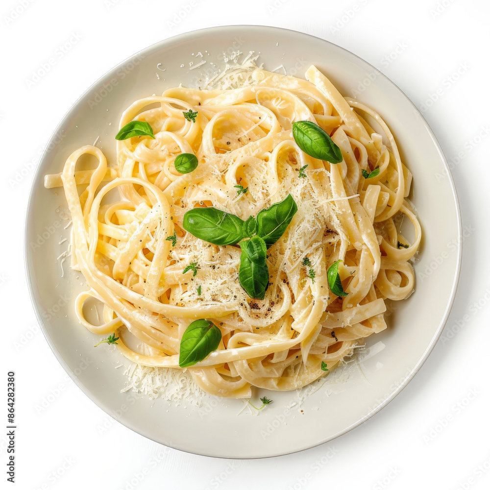A plate of pasta with creamy alfredo sauce and parmesan, isolated on white background A plate of pasta with creamy alfredo sauce and parmesan, isolated on white background