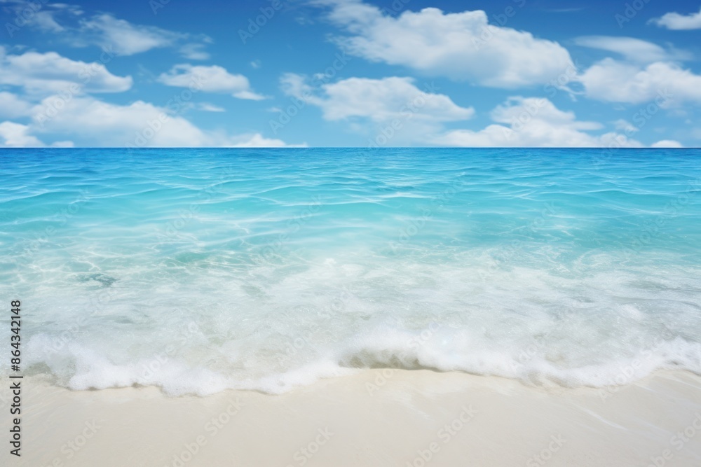 clear blue sea Separate water layers and wave foam. on a white background Shows the clarity of the water blue sky and the white sandy beach. clear blue sea Separate water layers and wave foam. on a white background Shows the clarity of the water blue sky and the white sandy beach.