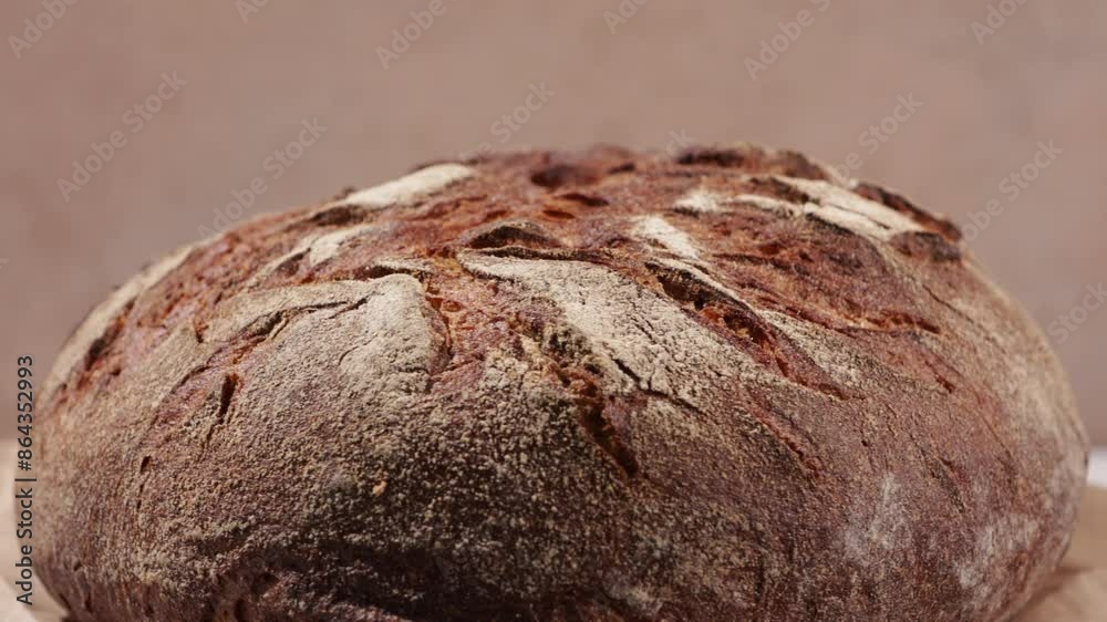 sourdough bread loaf with cracks close up food rotation