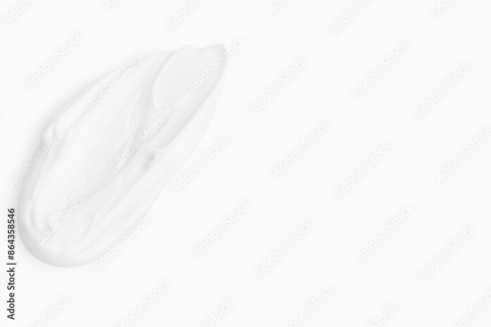 A smear of cream on a light background A smear of cream on a light background