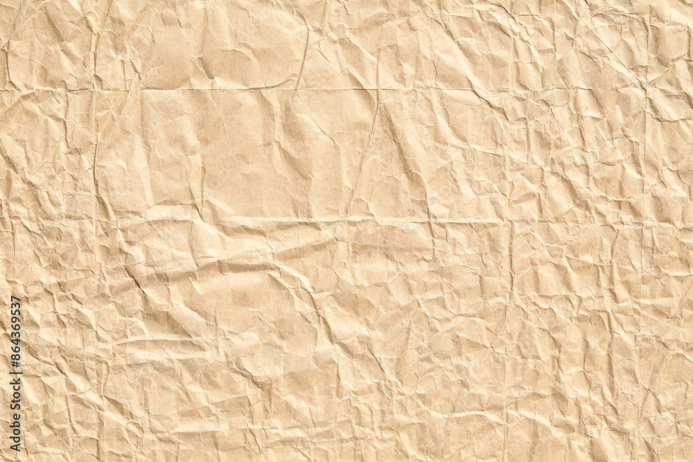 Obraz premium Crumpled and bumpy brown background paper texture