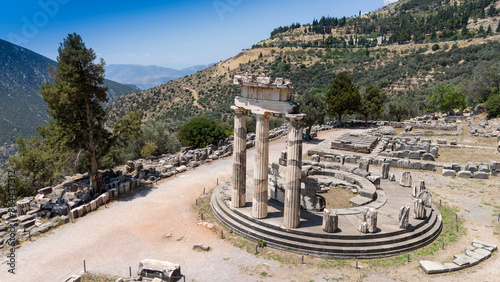Aerial bird's eye view photo taken by drone of archaeological site of ancient Delphi, site of temple of Apollo and the Oracle, Voiotia, Greece