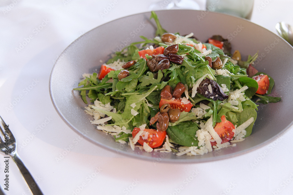 Fresh Green Salad with Olives and Tomatoes Fresh Green Salad with Olives and Tomatoes