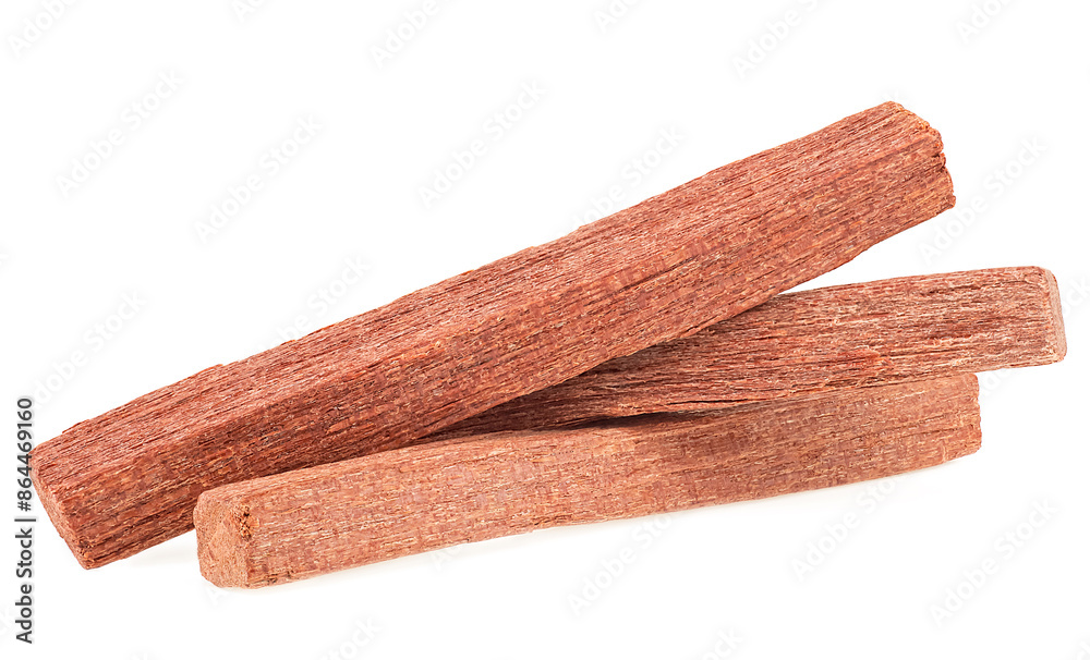 Chandan - group of sandalwood sticks isolated on a white background. Chandan - group of sandalwood sticks isolated on a white background.