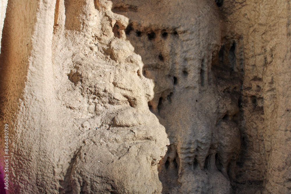 Background texture: stalactites and stalagmites in the cave. Close-up. Background texture: stalactites and stalagmites in the cave. Close-up.