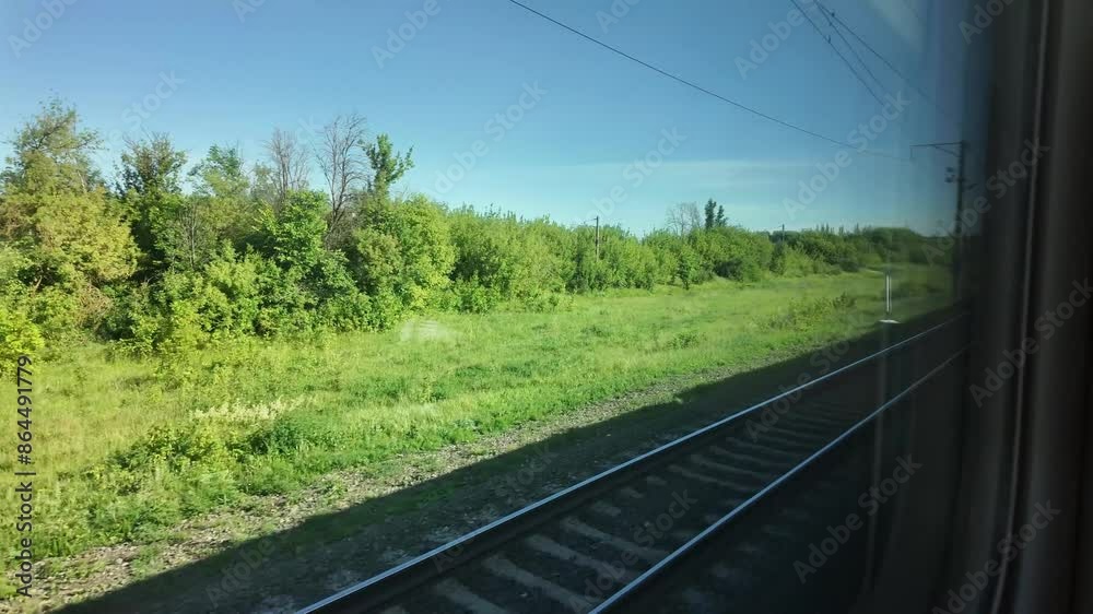 View from the train window to nature, summer travel View from the train window to nature, summer travel