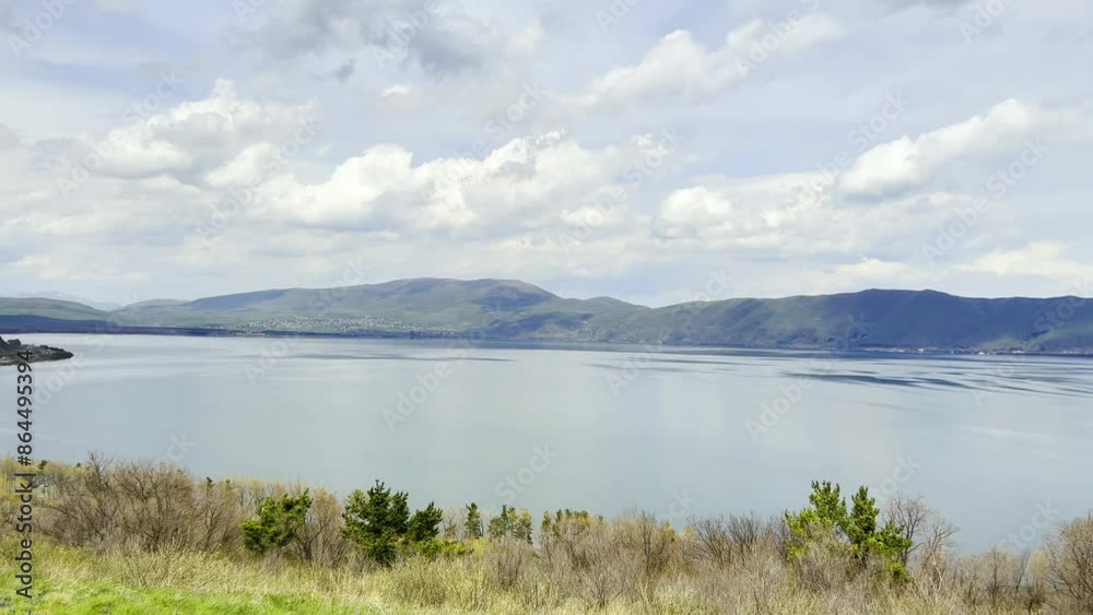 view of famous Sevan lake at spring sunny day. Travel and tourist destinations of Armenia view of famous Sevan lake at spring sunny day. Travel and tourist destinations of Armenia