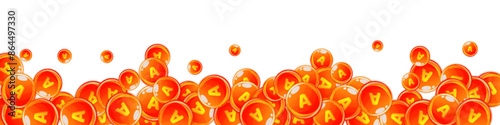 Vitamin A round capsules scattered randomly.