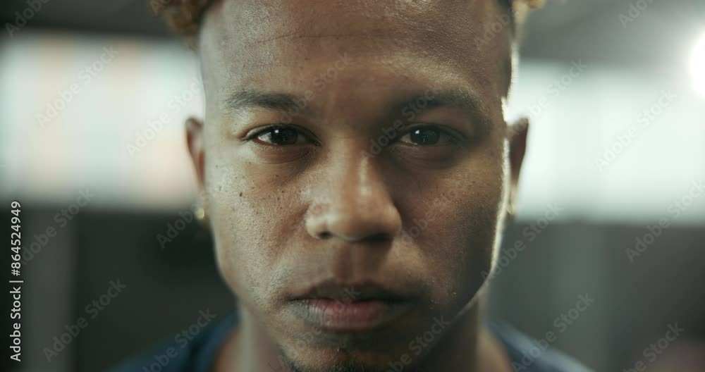 Face, fitness and intense with man in gym for start of exercise, training or workout routine. Challenge, confident and portrait of serious African person in health club for improvement or performance Face, fitness and intense with man in gym for start of exercise, training or workout routine. Challenge, confident and portrait of serious African person in health club for improvement or performance