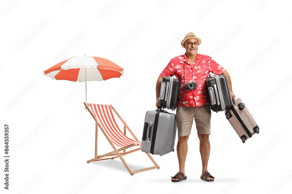 © Ljupco Smokovski - Mature male tourist carrying suitcases near a beach chair and umbrella