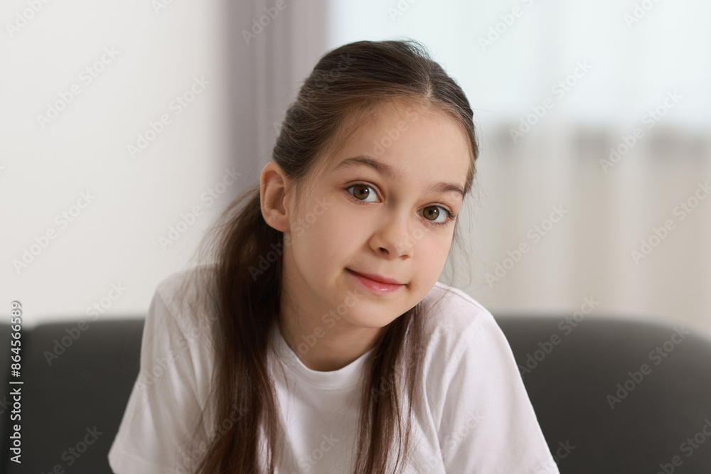 Portrait of beautiful little girl indoors. Cute child Portrait of beautiful little girl indoors. Cute child