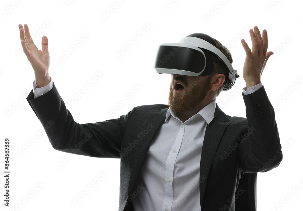 Emotional man using virtual reality headset while sitting in office chair on white background Emotional man using virtual reality headset while sitting in office chair on white background