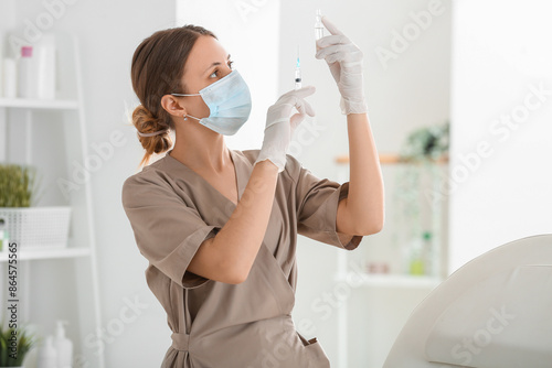Female cosmetologist with s...